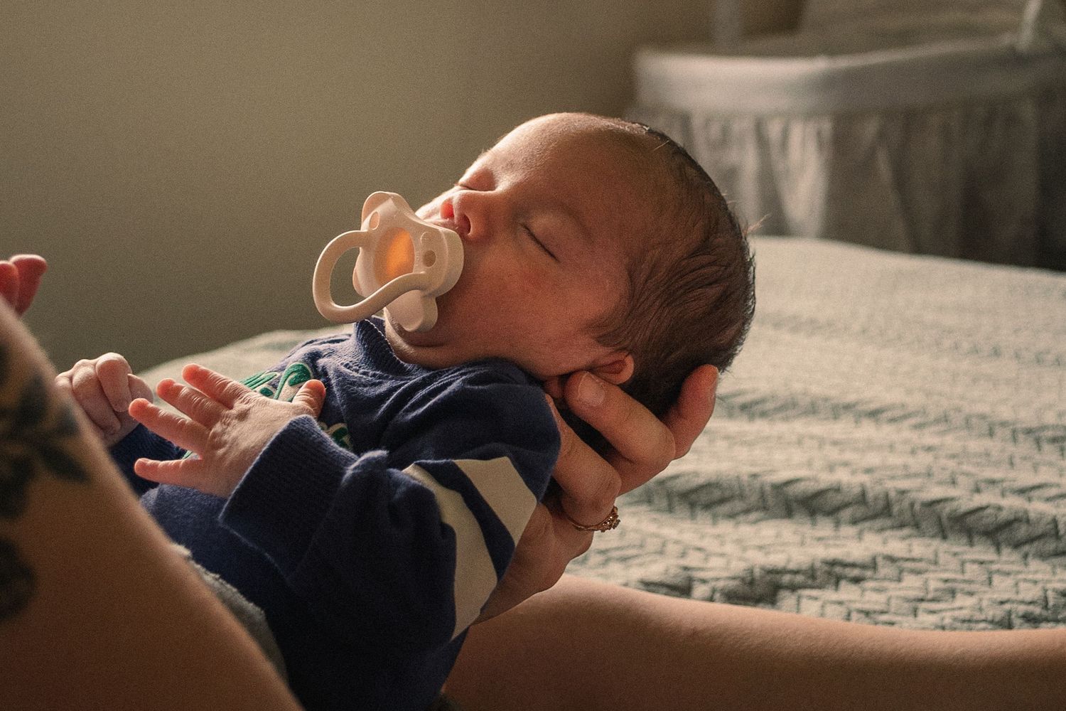 A tender family moment captured in a series of close-up shots showing affectionate interactions.