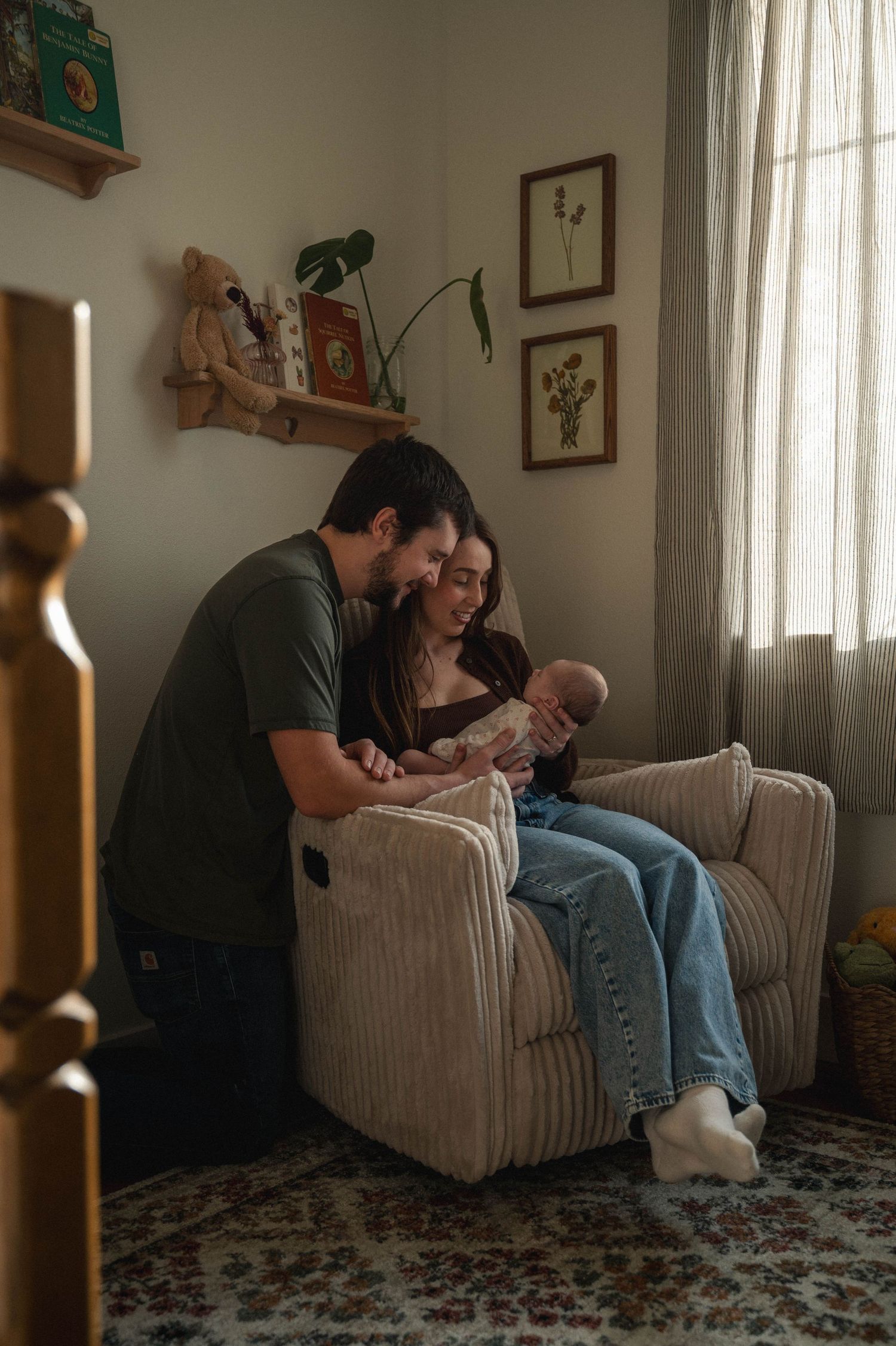 Three connected photos show a tender moment between family members relaxing together on a beige couch in a cozy living room.