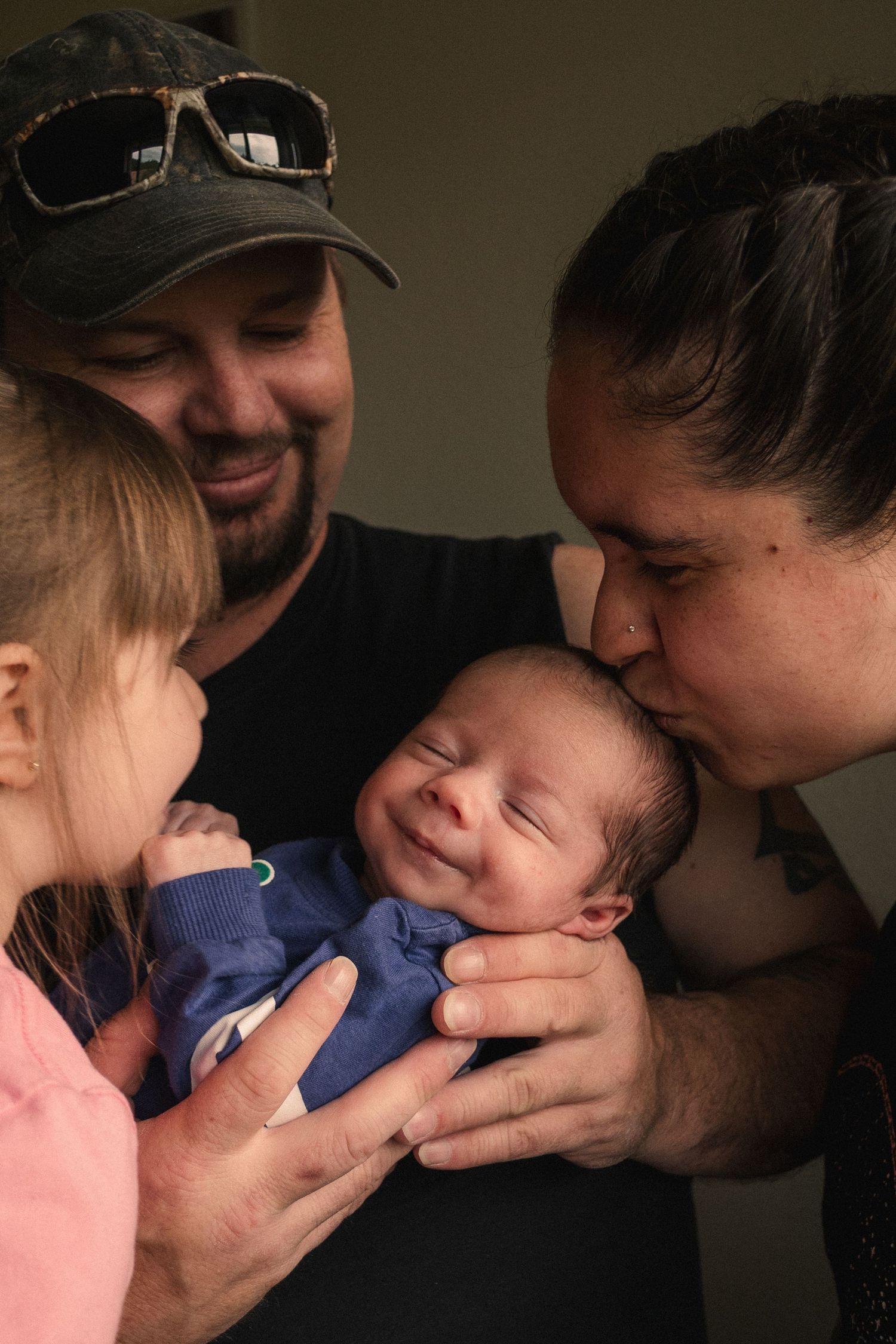 A series of intimate family portraits showing tender moments and expressions of love.