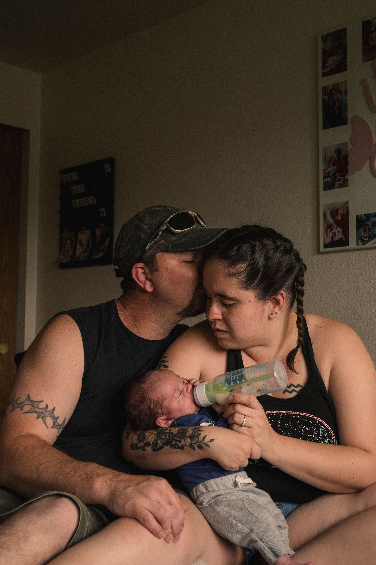 Intimate family moment captured in warm indoor lighting.