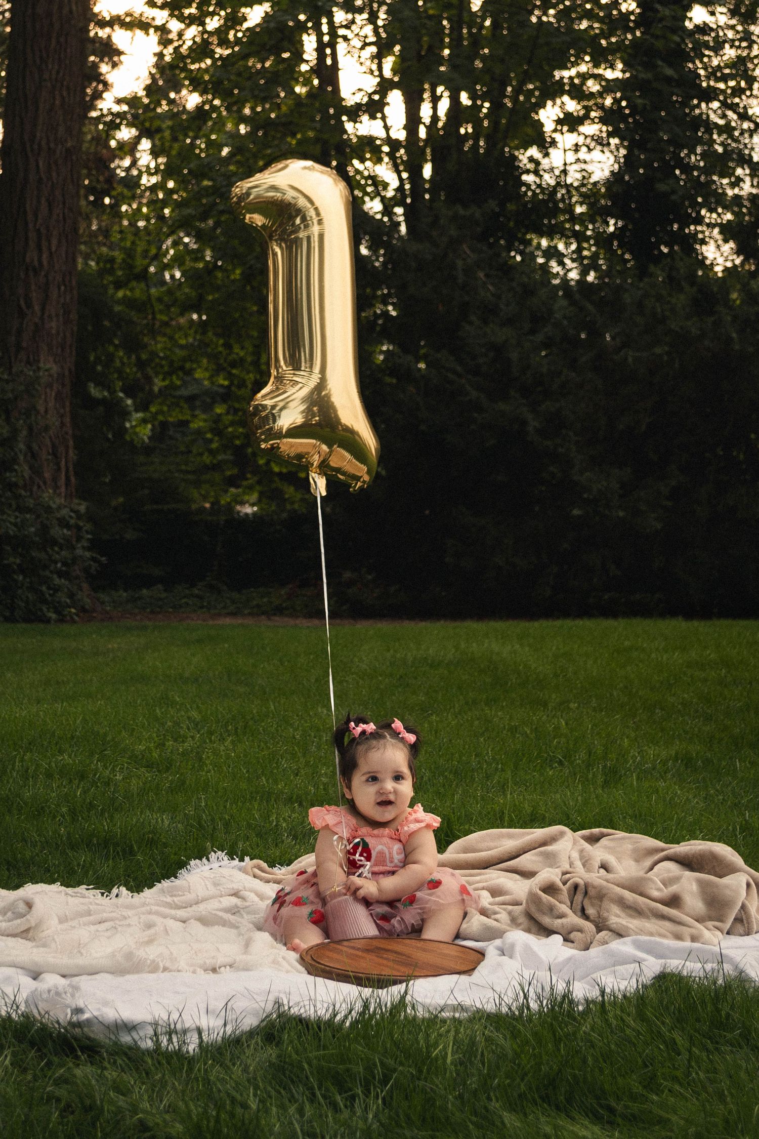 Toddler enjoying cake for their first birthday in Stayton, Oregon.