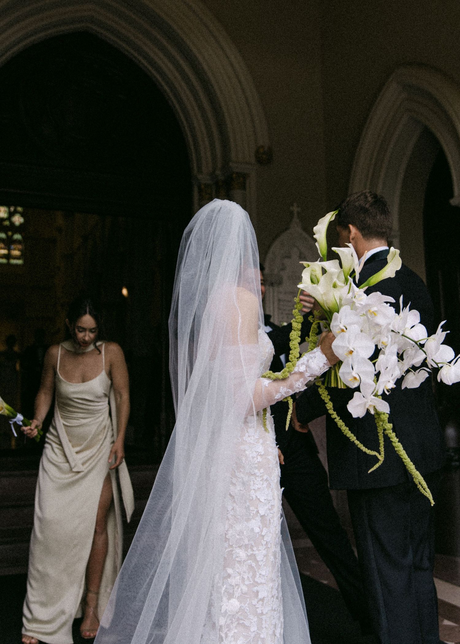 Series of wedding moments captured in church featuring elegant white gown and flowing veil.