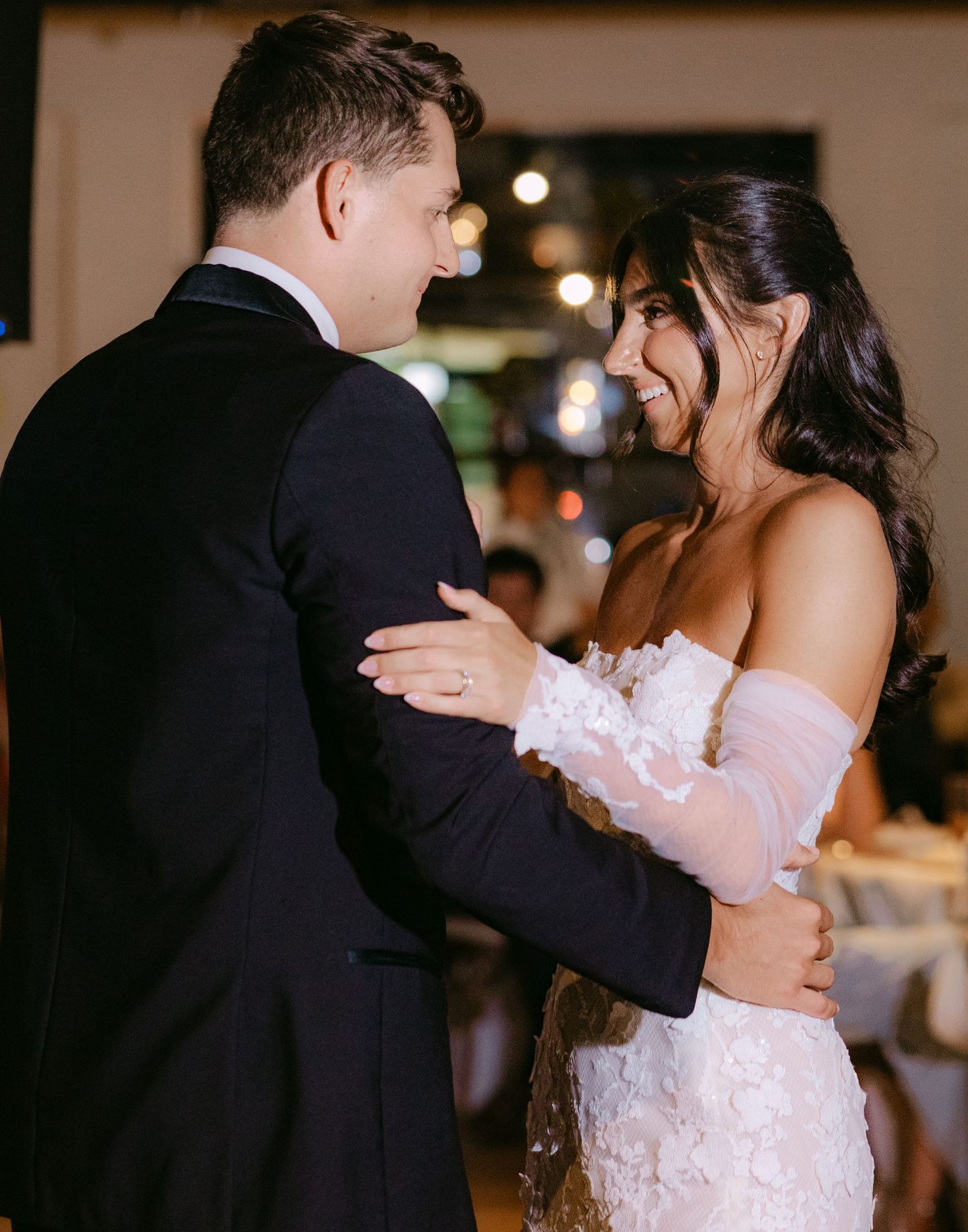 Couple shares an intimate slow dance together at their wedding reception.