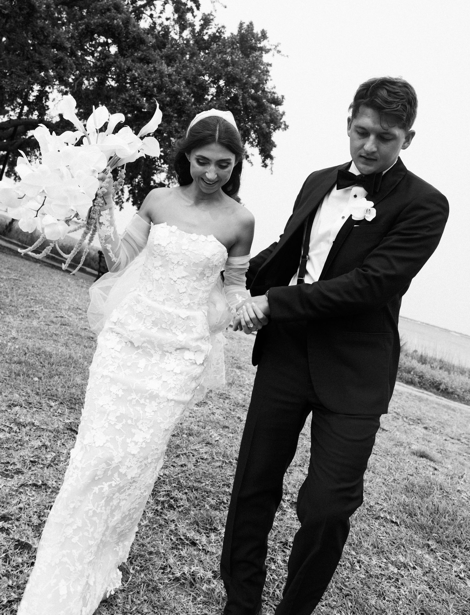 Black and white photo series of newlyweds sharing candid moments outdoors.