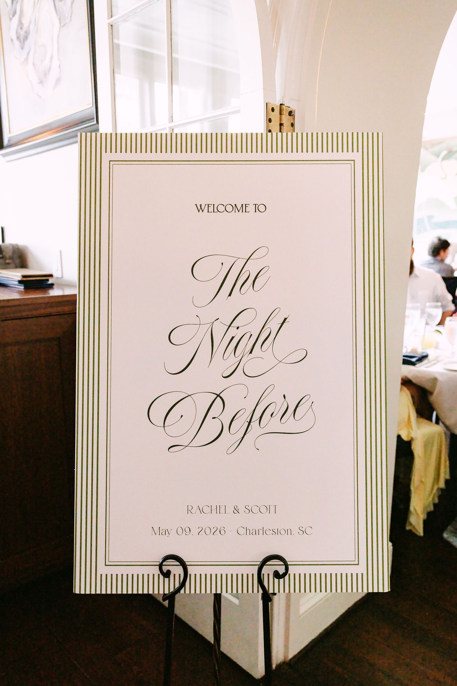 Elegant welcome sign for Rachel and Scott rehearsal dinner reading The Night Before in script font.