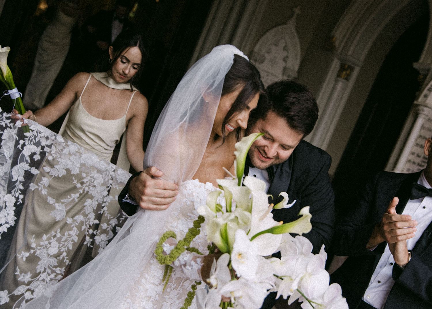 Candid wedding ceremony moments showing bridal party interactions in church setting.