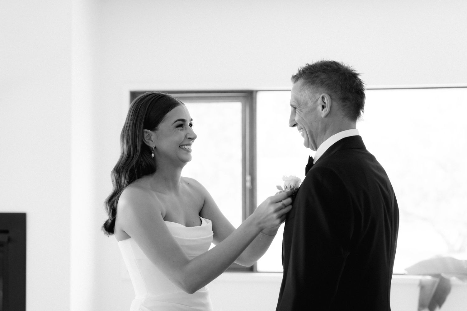 A candid black and white photo sequence showing emotional interactions between formally dressed individuals.
