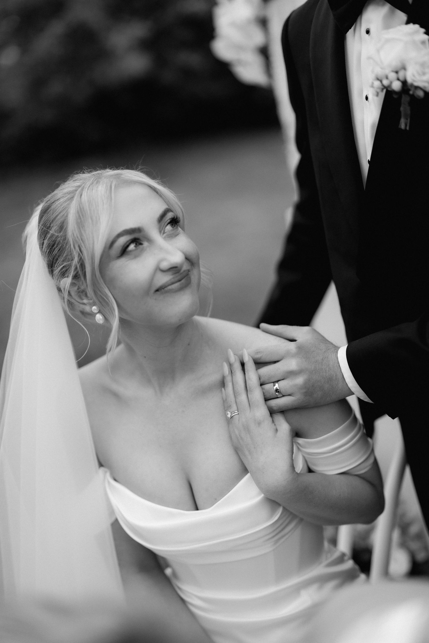 A series of intimate black and white wedding moments showing tender expressions and emotions.