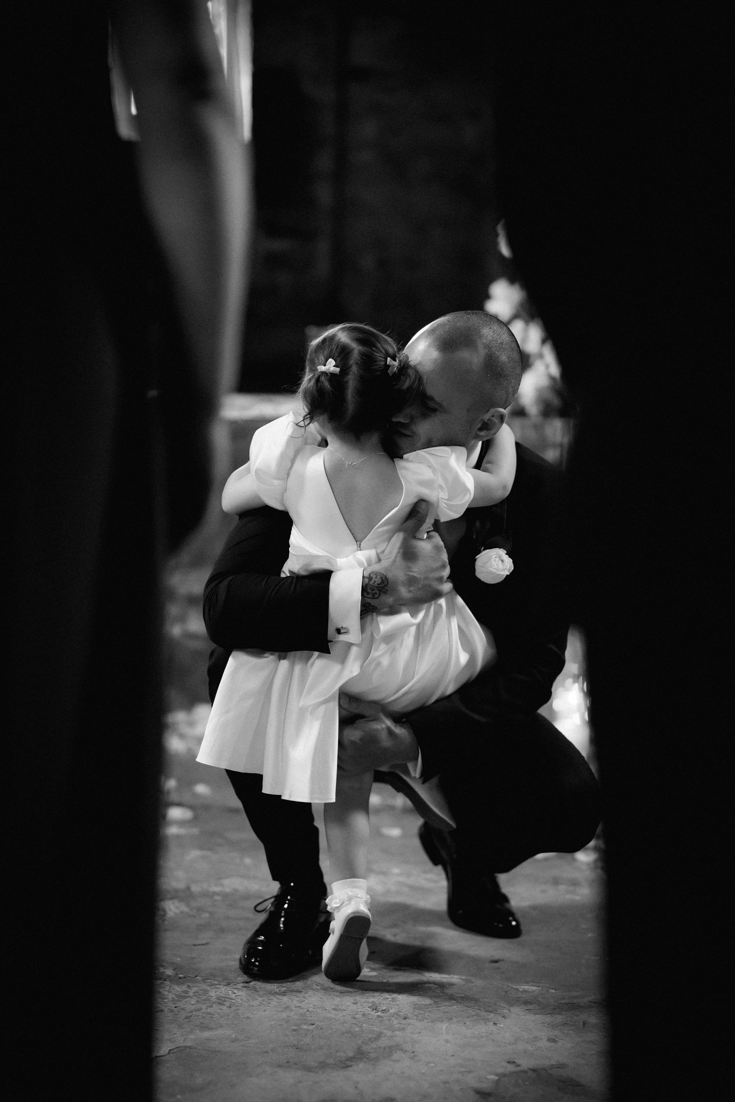 Artistic black and white dance photos capturing low-angle movements of formal wear and footwork.