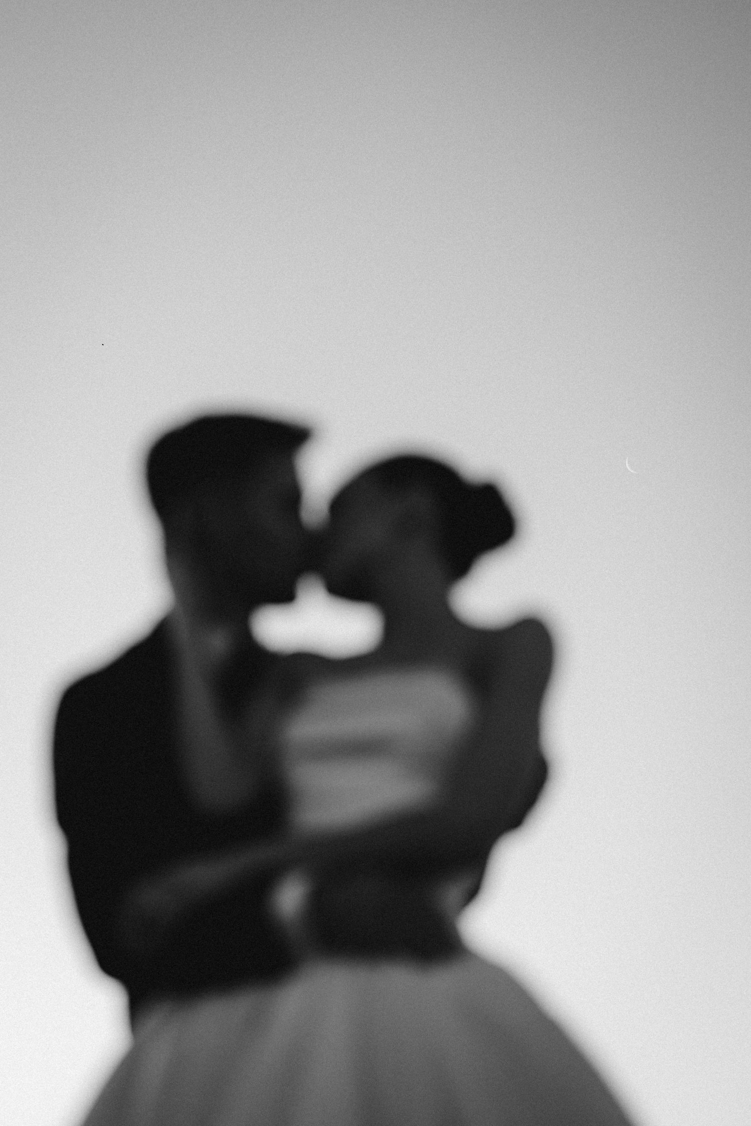 Artistic silhouette series showing romantic couple moments against light background.