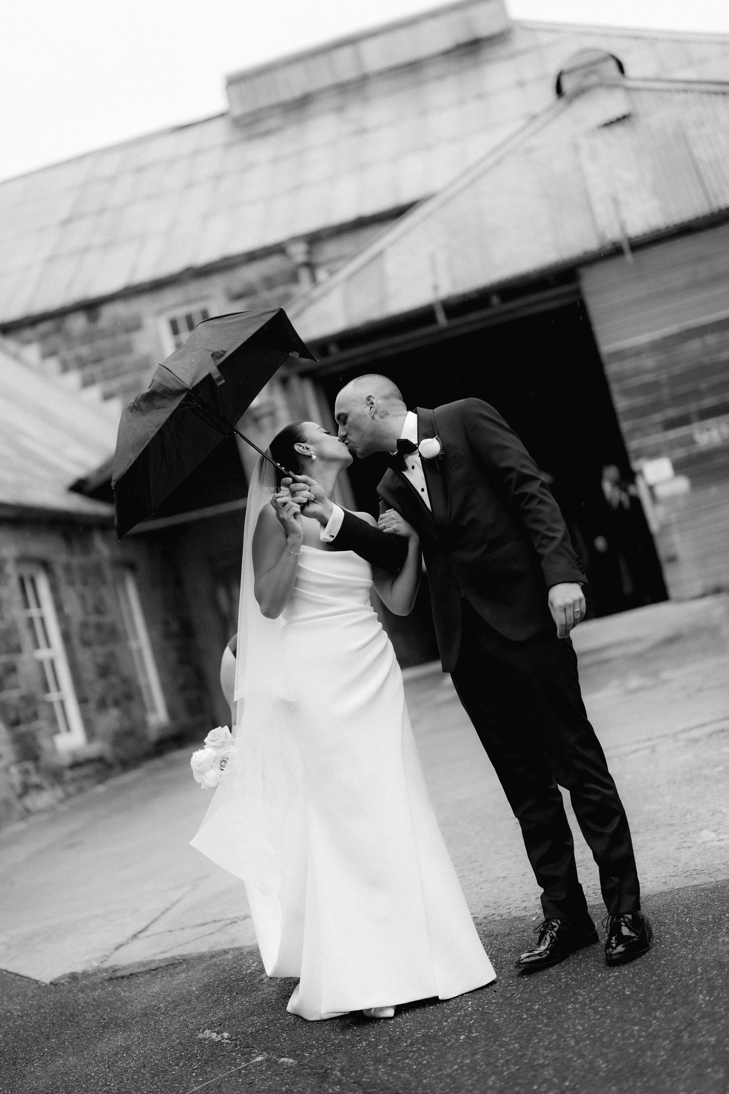 Dynamic black and white sequence showing couple's dramatic dance moves outdoors.
