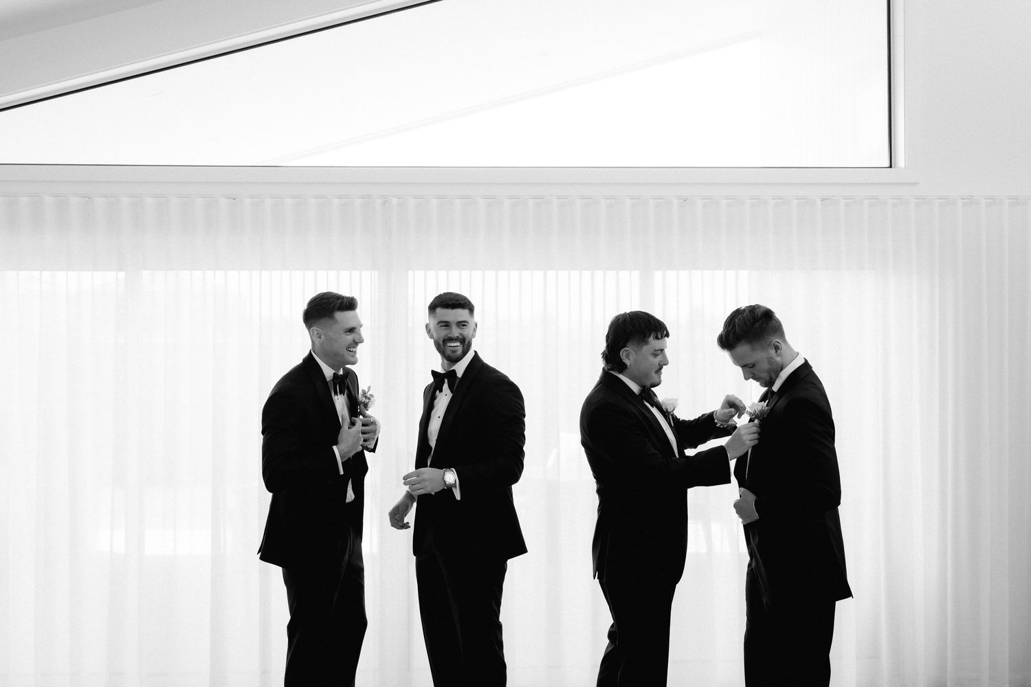A series of black and white photographs showing intimate moments between people in formal attire.