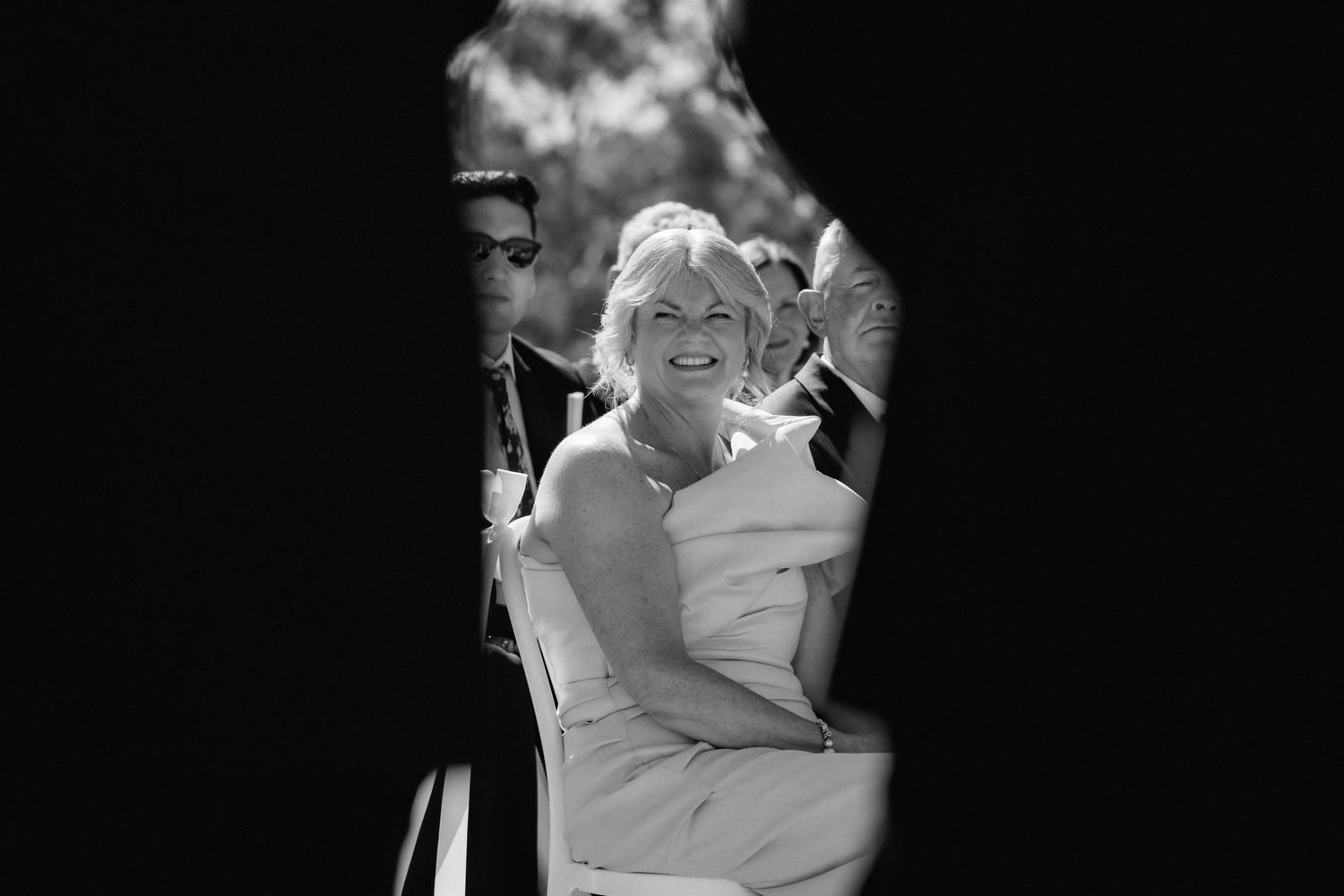 Black and white photos capture intimate moments during wedding reception dancing.