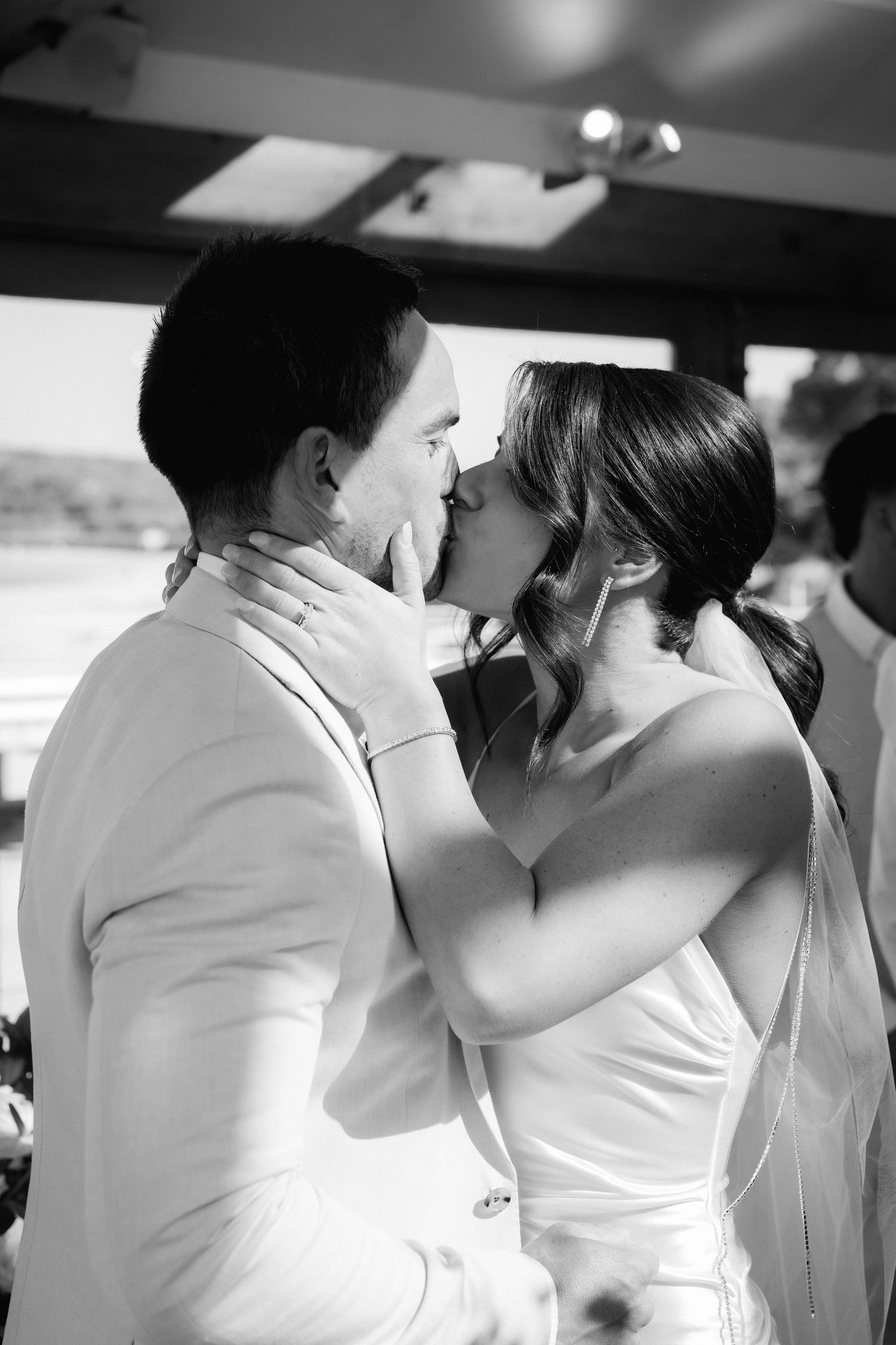 Series of romantic black and white photos capturing a couple's intimate first dance at their wedding reception.