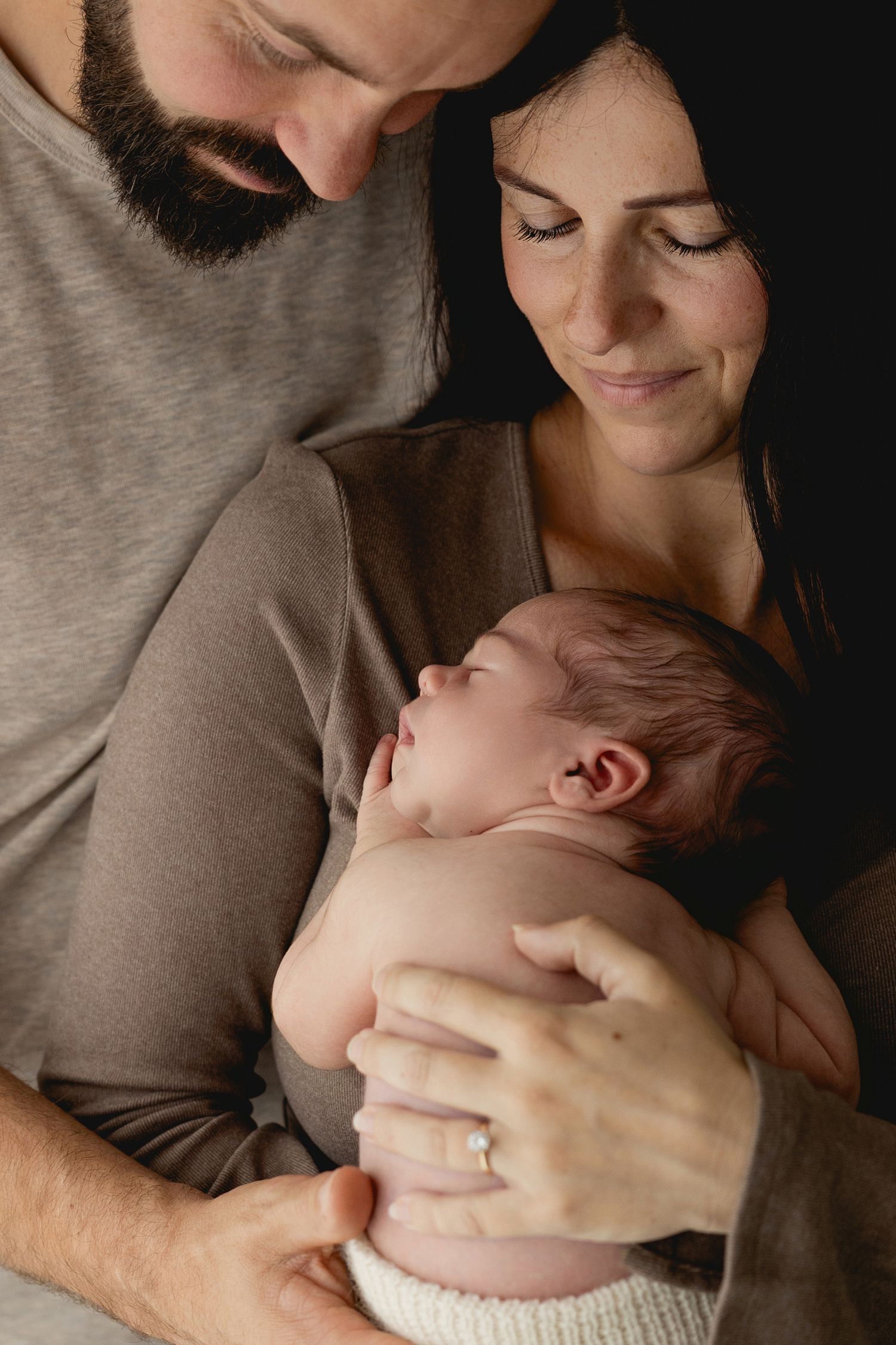 Newborn baby on a newborn baby photoshoot. Studio based in Ferndown, Bournemouth, Dorset.