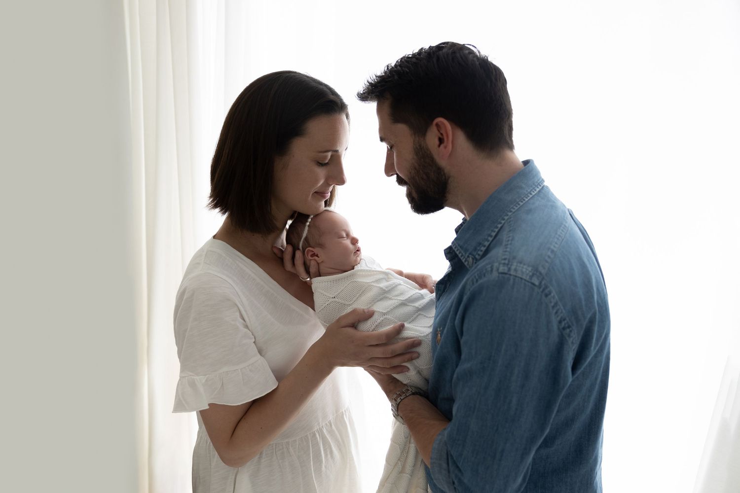 Family photoshoot with newborn baby. Taken in my family friendly studio in Dorset, Hampshire.