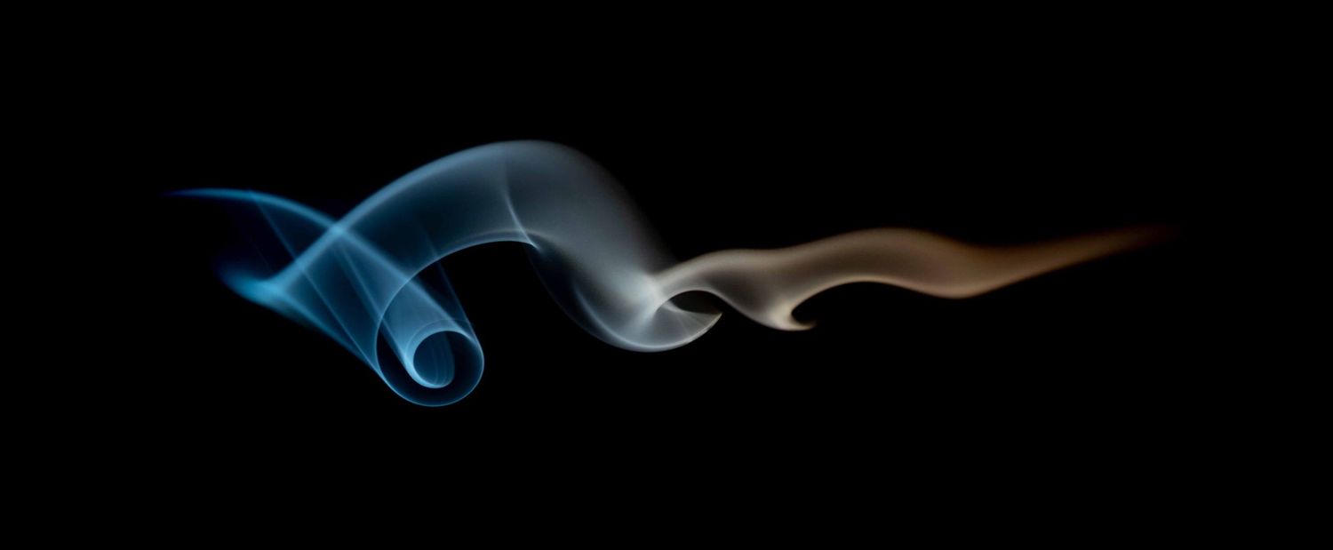 Abstract fine art photography print featuring flowing blue and amber shapes on black, by Anthony West