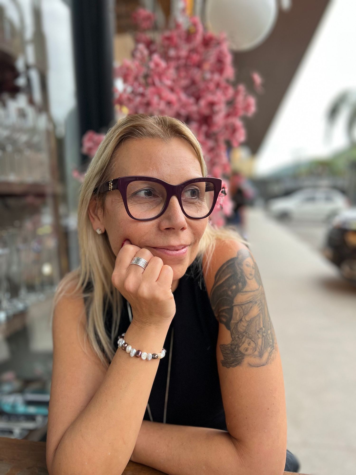 Personal branding portrait of a woman outside a wine bar in Rio de Janeiro, Brazil by Anthony West Photography