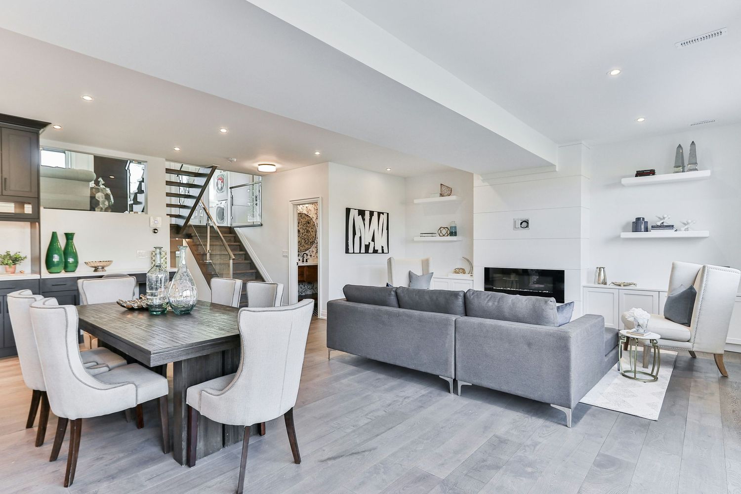 Placeholder stock image of a modern open plan living and dining room, real estate photography - https://unsplash.com/