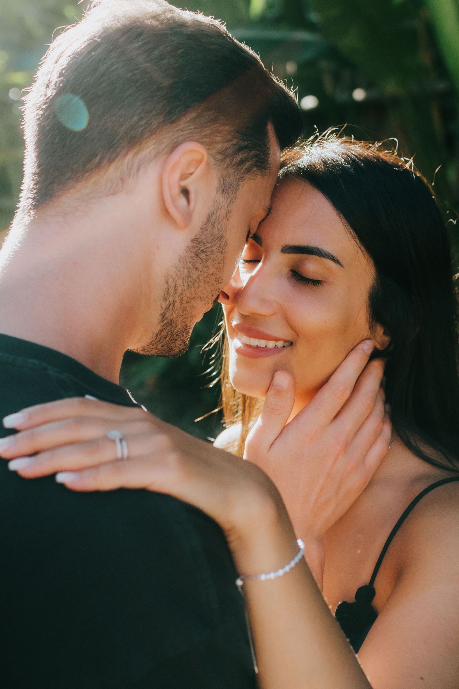 Tender romantic moments captured in close-up shots with soft natural lighting.
