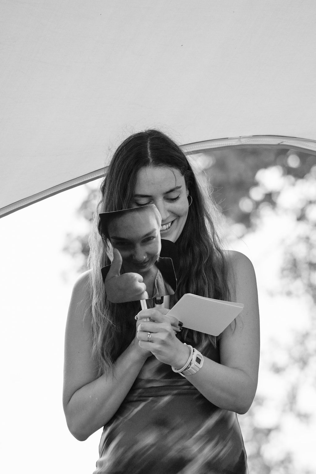 A series of emotional moments captured as someone wipes away tears while looking down.