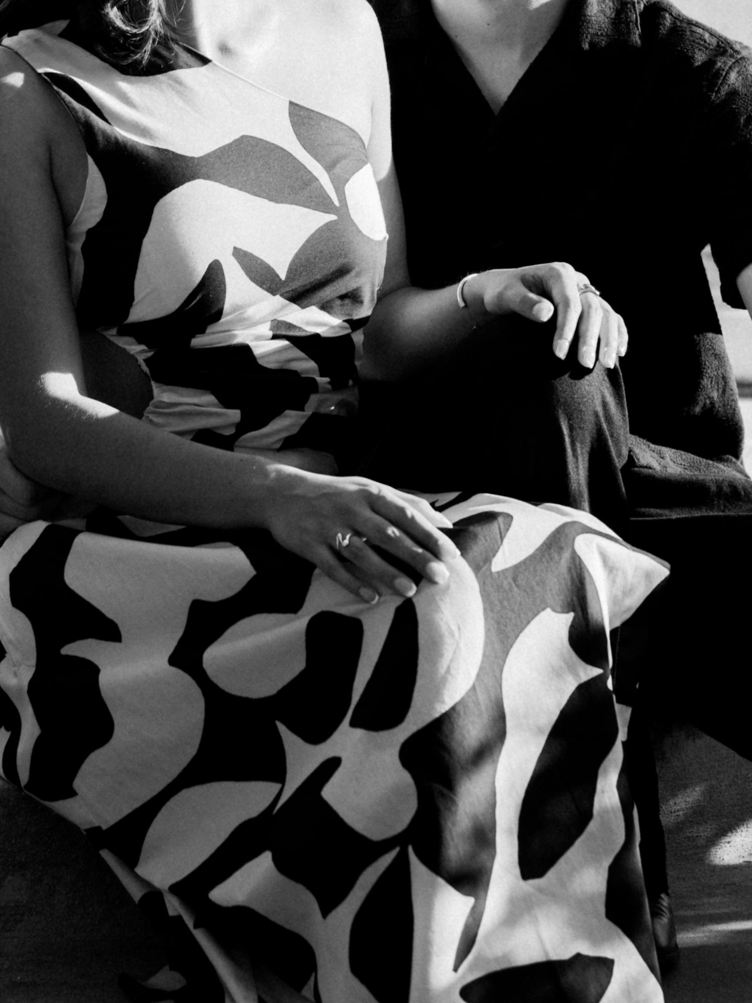 Abstract black and white shadows and patterns on fabric.