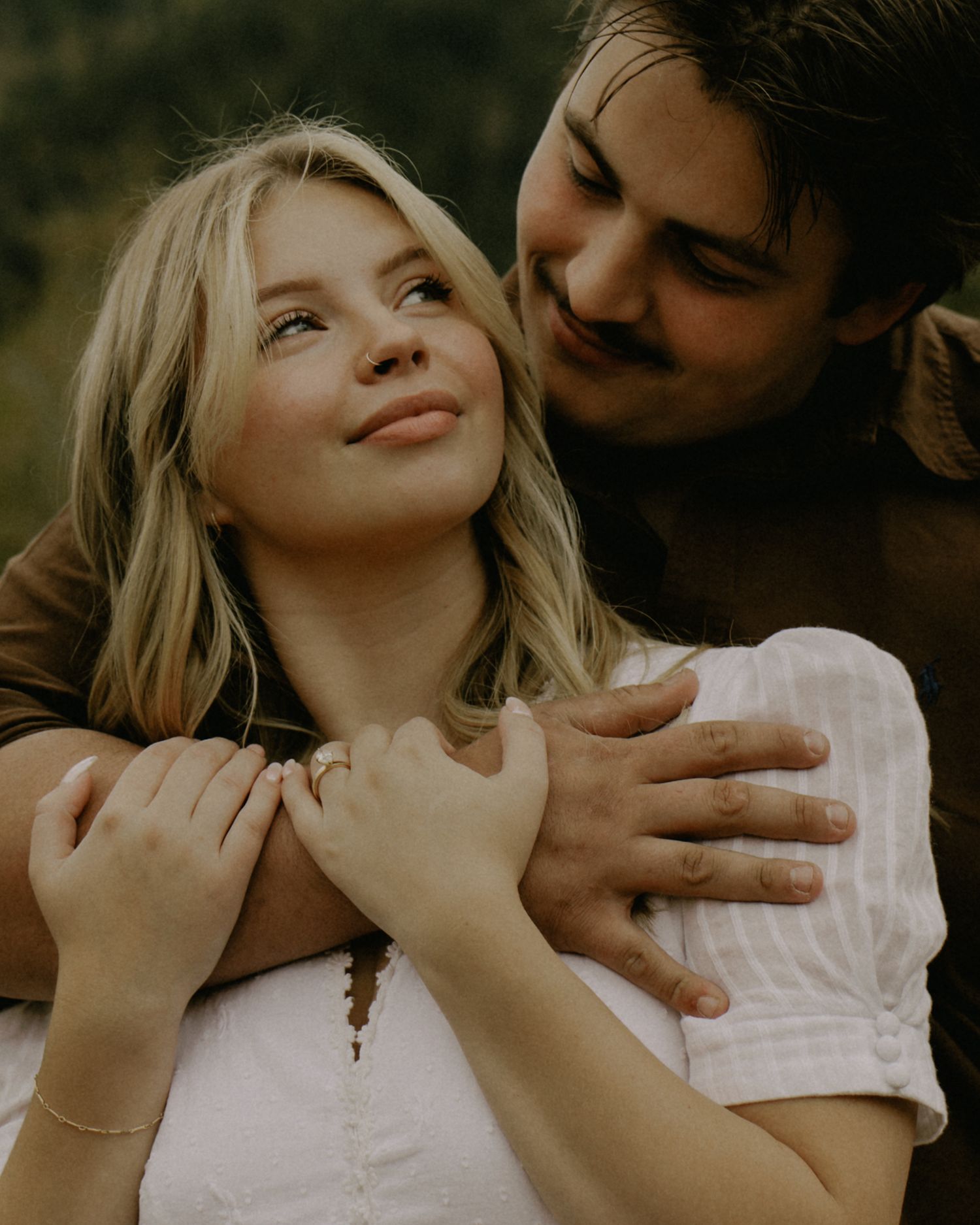Romantic couple photography session with soft warm lighting and intimate poses.