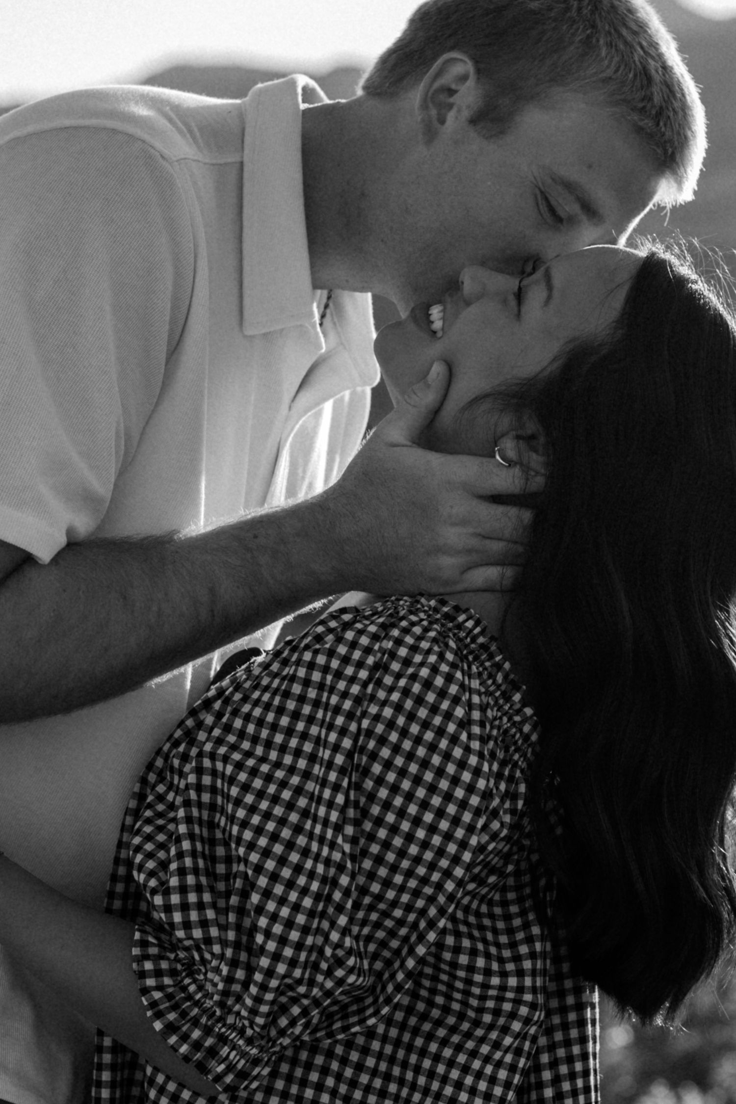 A series of black and white romantic moments showing gentle intimacy and connection.