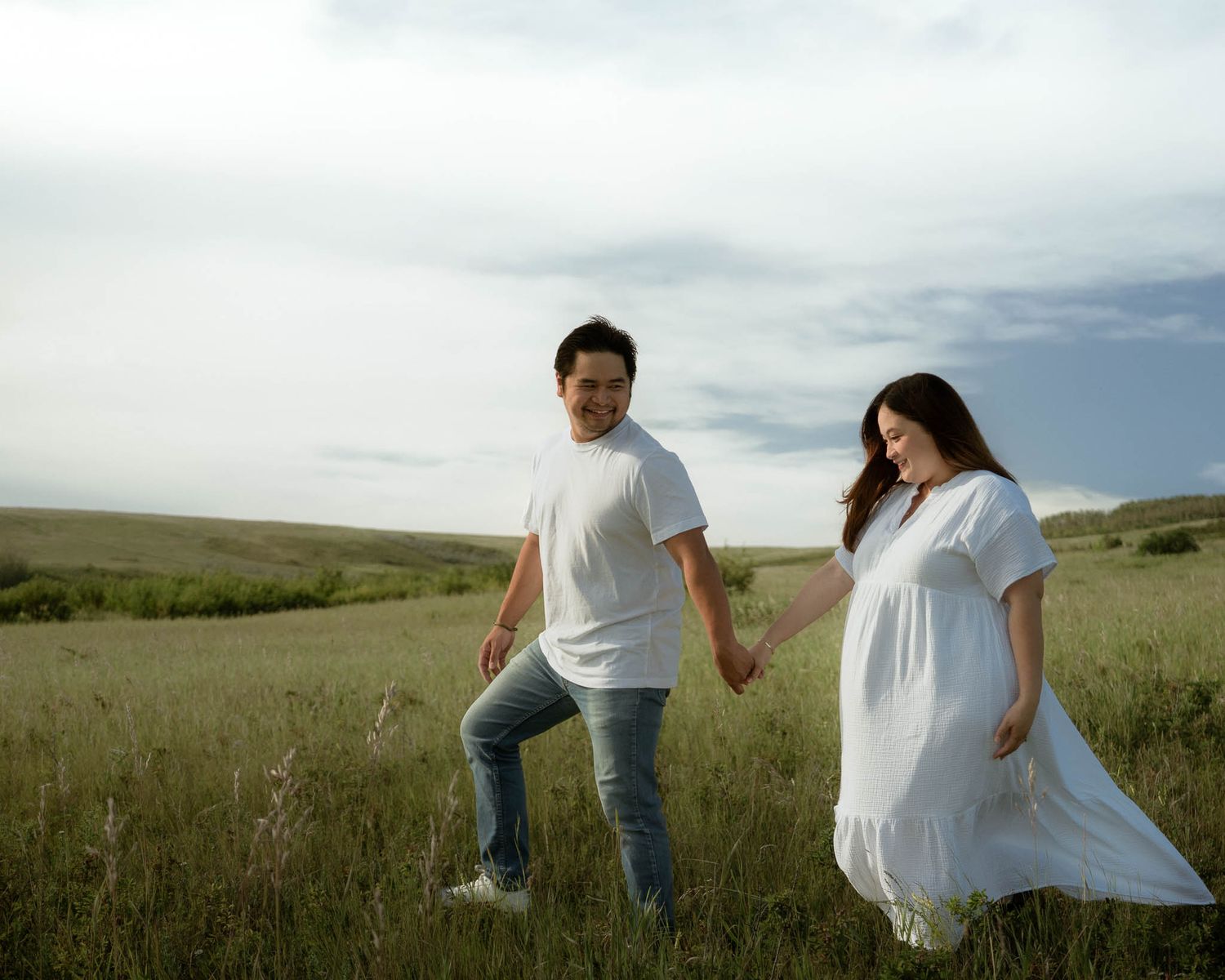 Calgary maternity photographer captures soft, candid moment with mother and partner