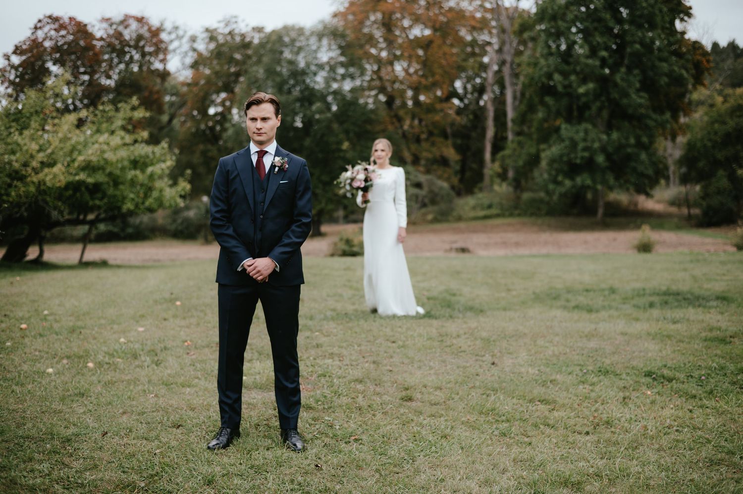 First look. Groom waiting on his bride