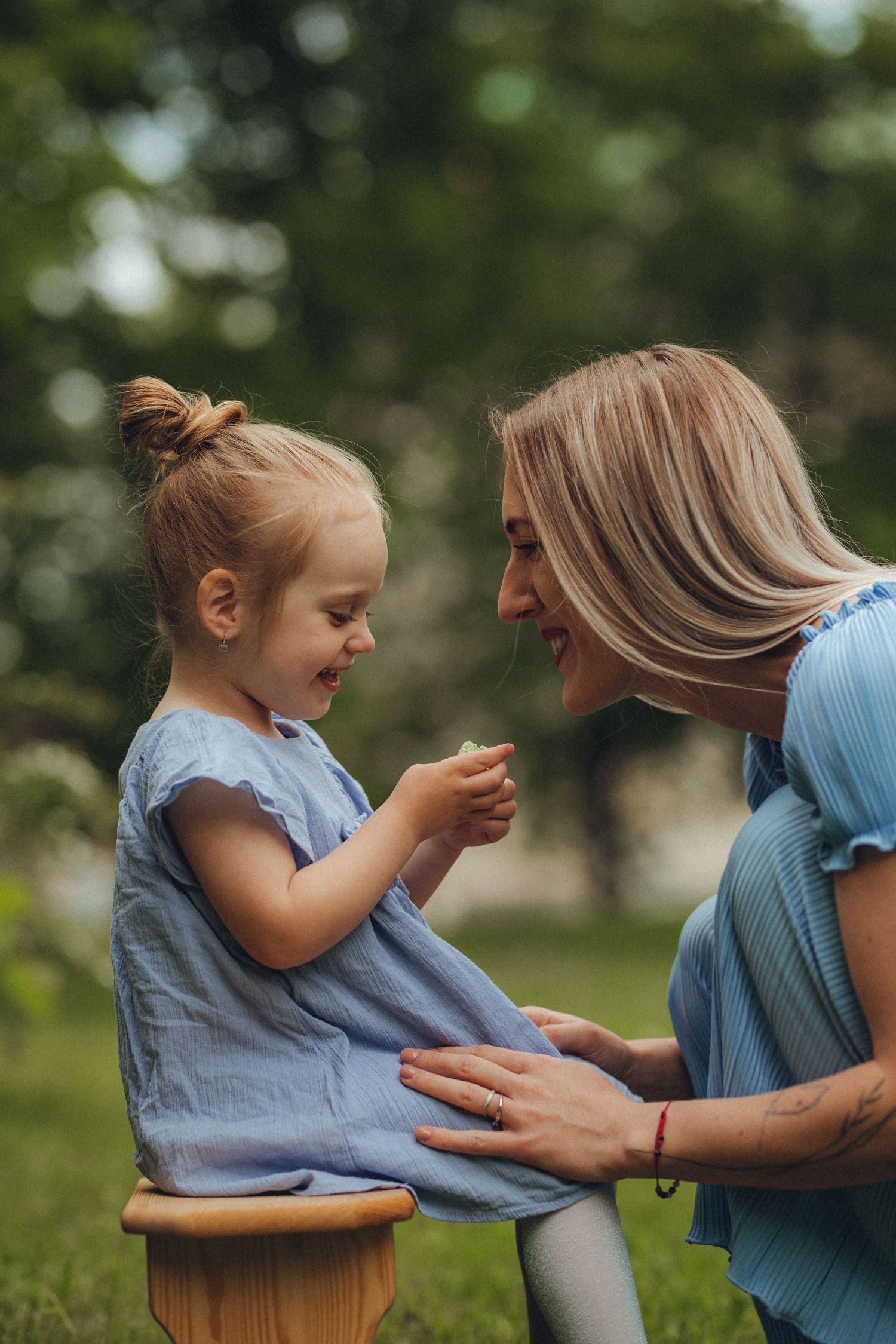 Mother and child share playful outdoor moments in a series of candid photographs.