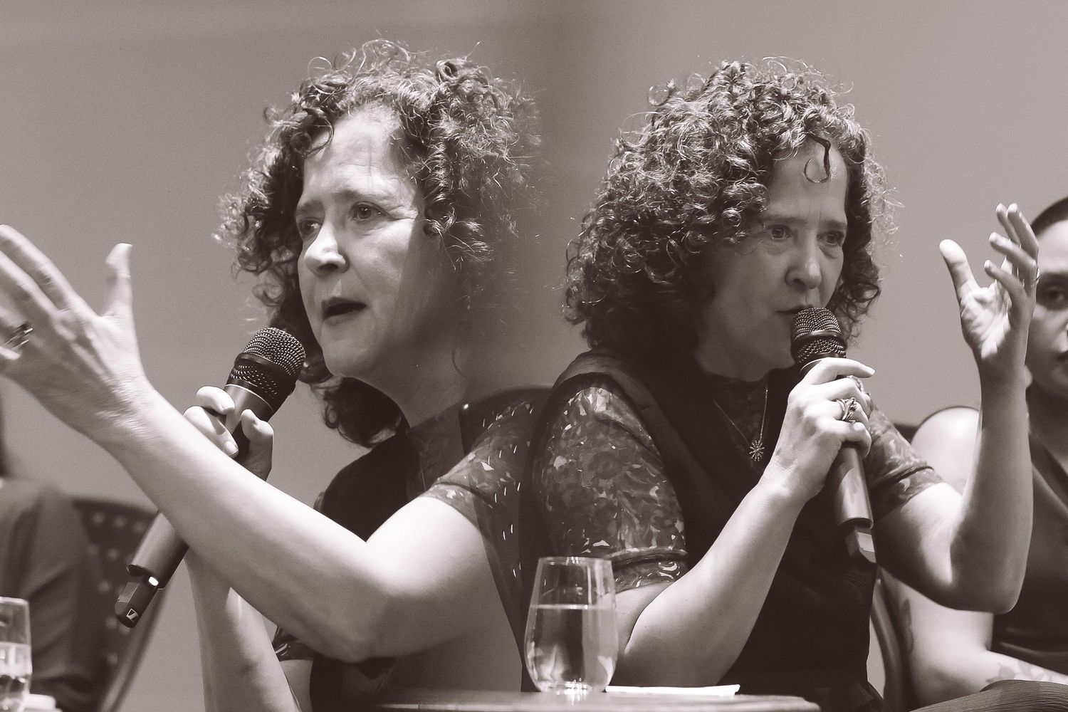 A series of black and white photos showing a singer performing passionately on stage.
