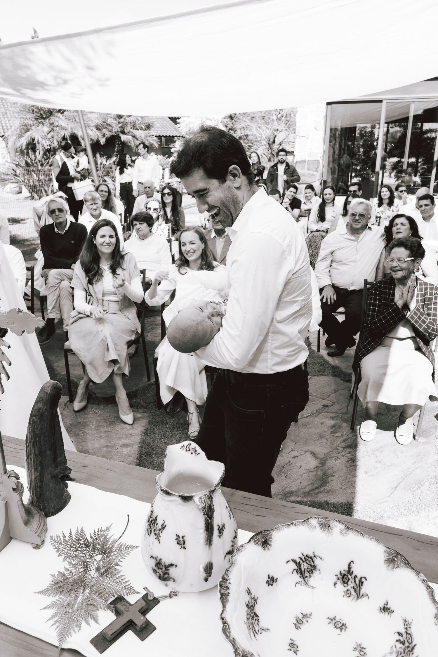 A sequence of black and white photos showing people dancing at what appears to be a wedding reception.