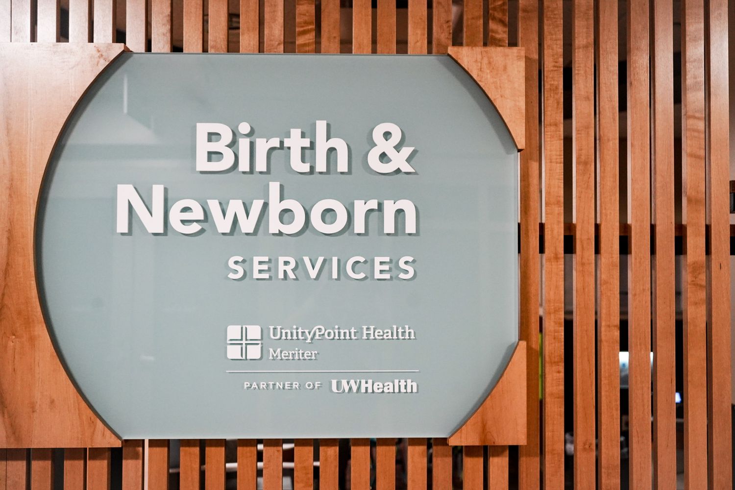 Hospital hallway sign for Birth and Newborn Services department.