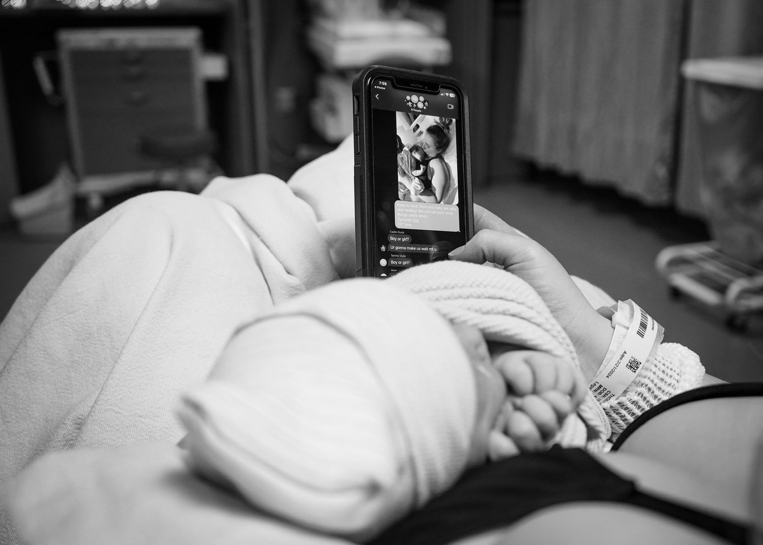 Black and white hospital room scene with medical equipment.