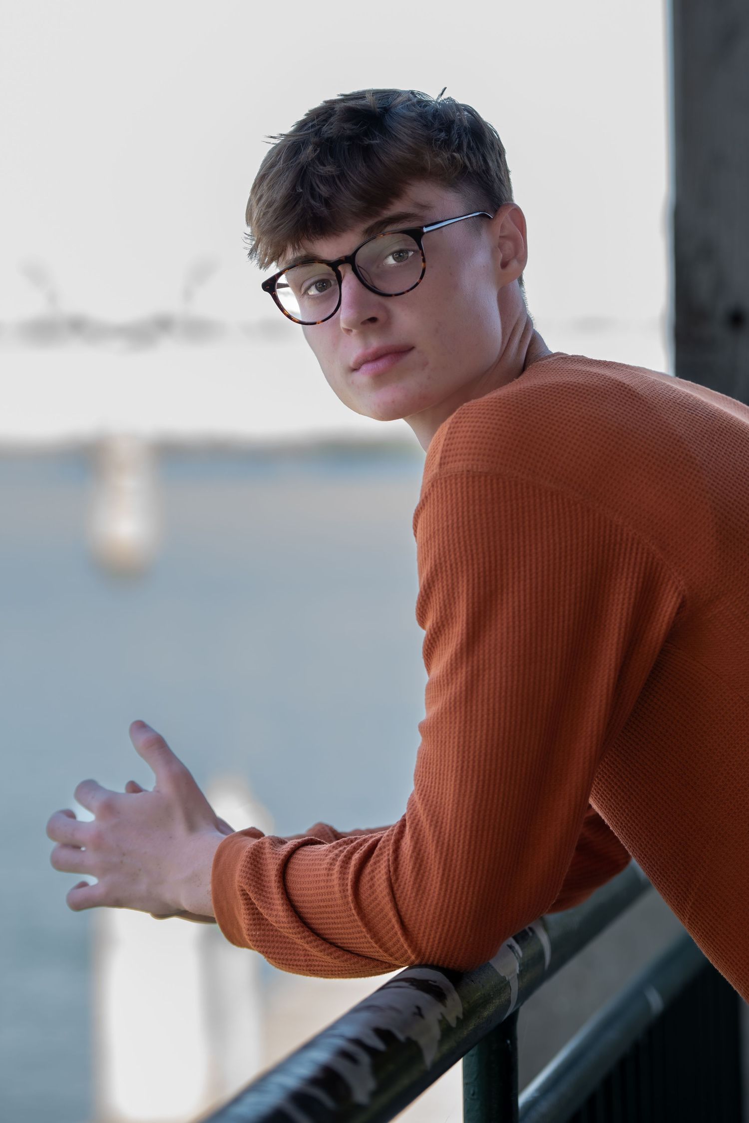Boys senior photo session overlooking water