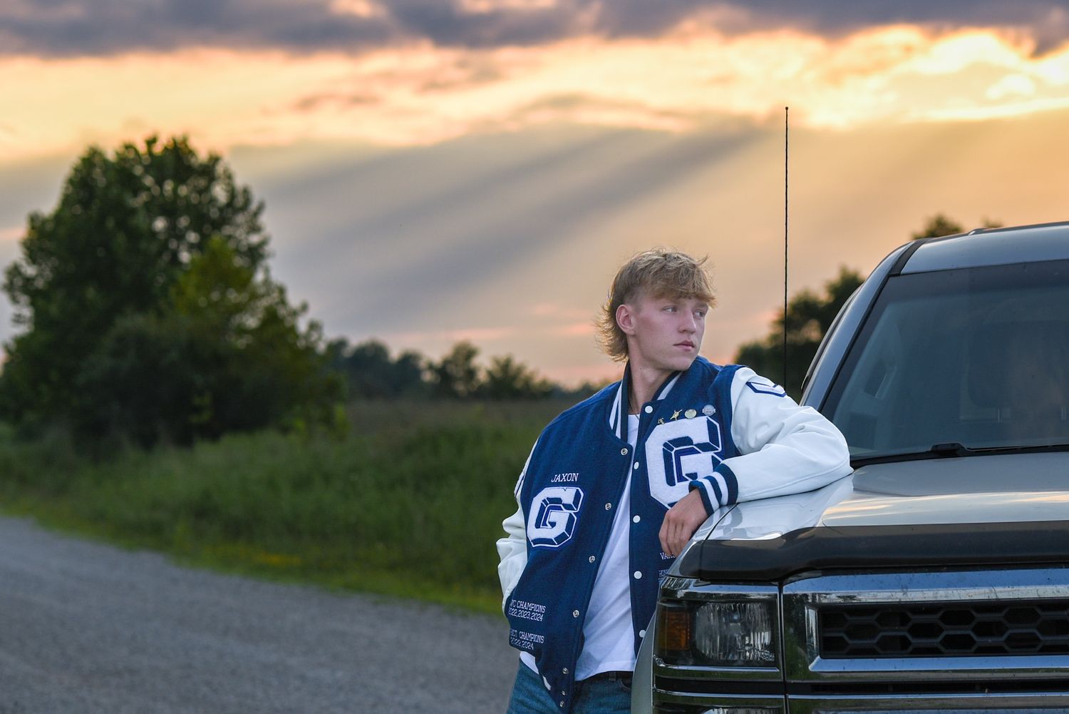 truck and varsity letter sunset