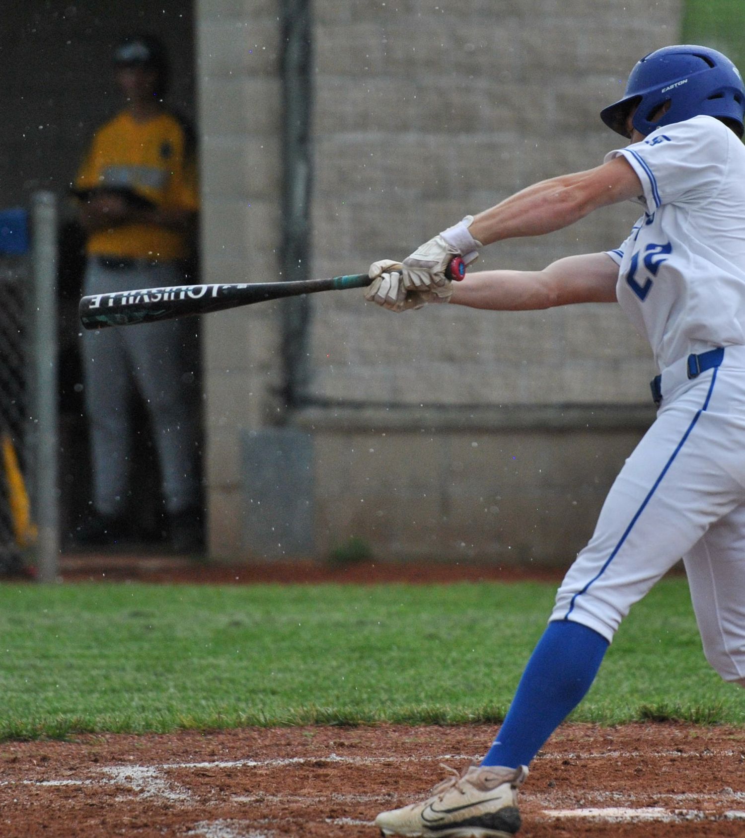 Louisville slugger at bat in the rain