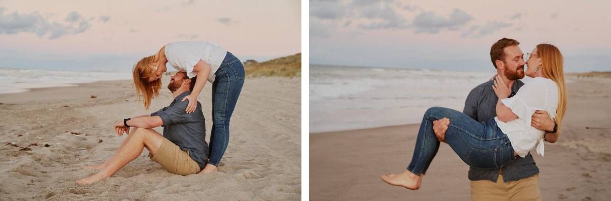 Couple playfully posing on a sandy beach at sunset, with ocean waves in the background.