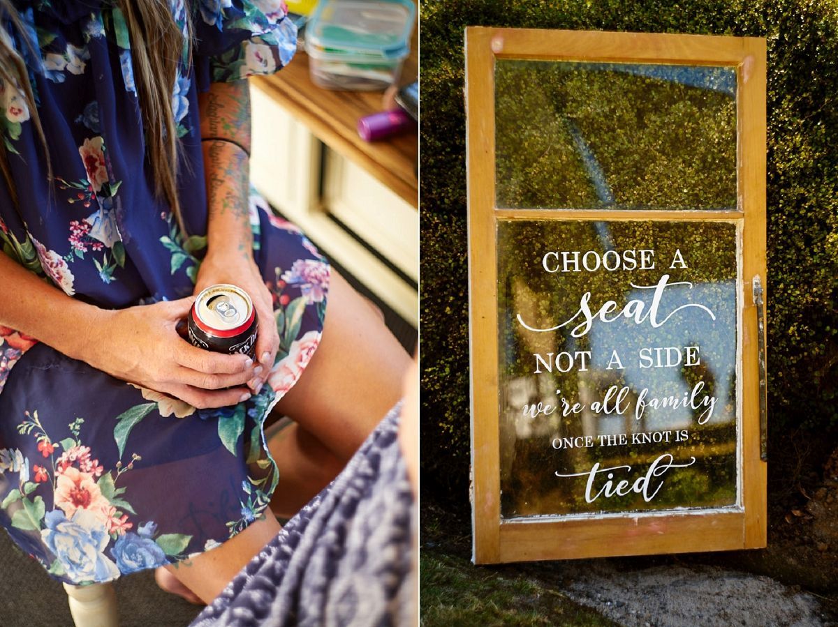 Wedding sign reads choose a seat not a side next to woman holding a can.