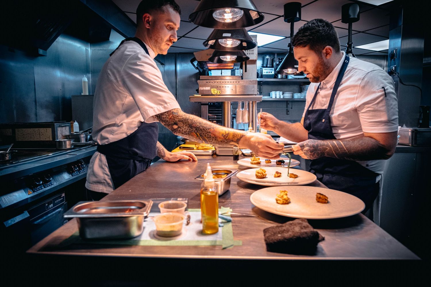 Candid portrait of Yorkshire chefs at work in the kitchen, photographed for Simon Robertson’s Shooting Chefs project.
