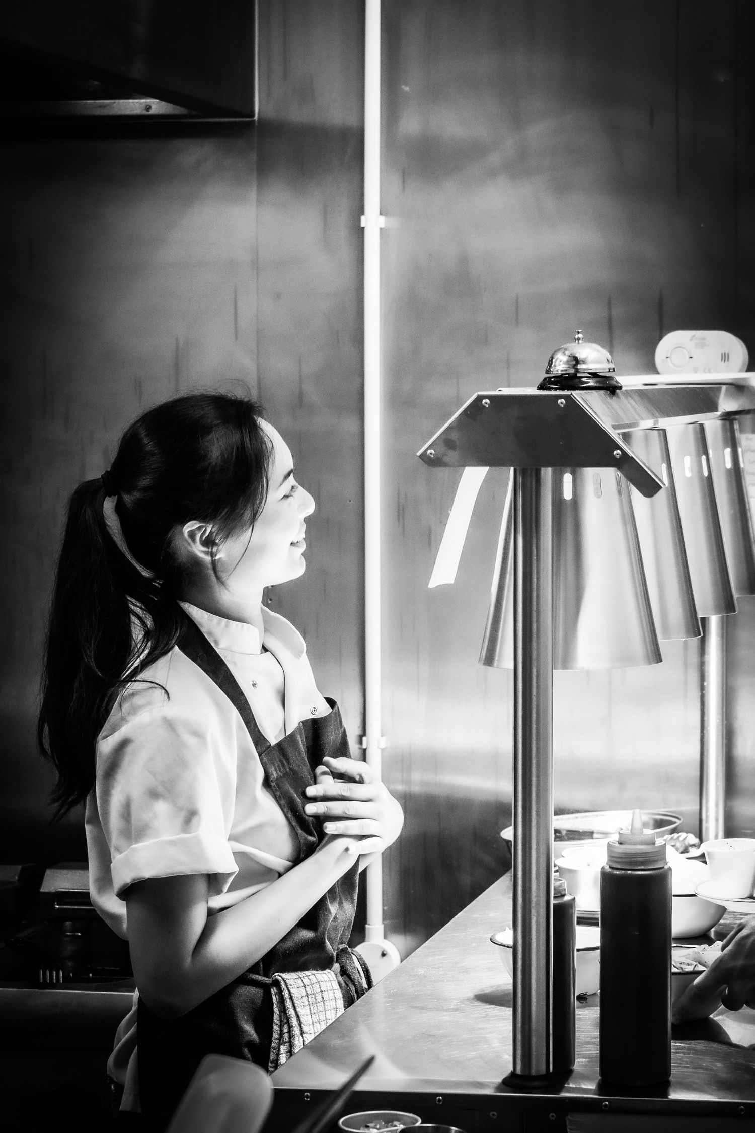 Candid portrait of a North Yorkshire chef at work in the kitchen, photographed for Simon Robertson’s Shooting Chefs project.
