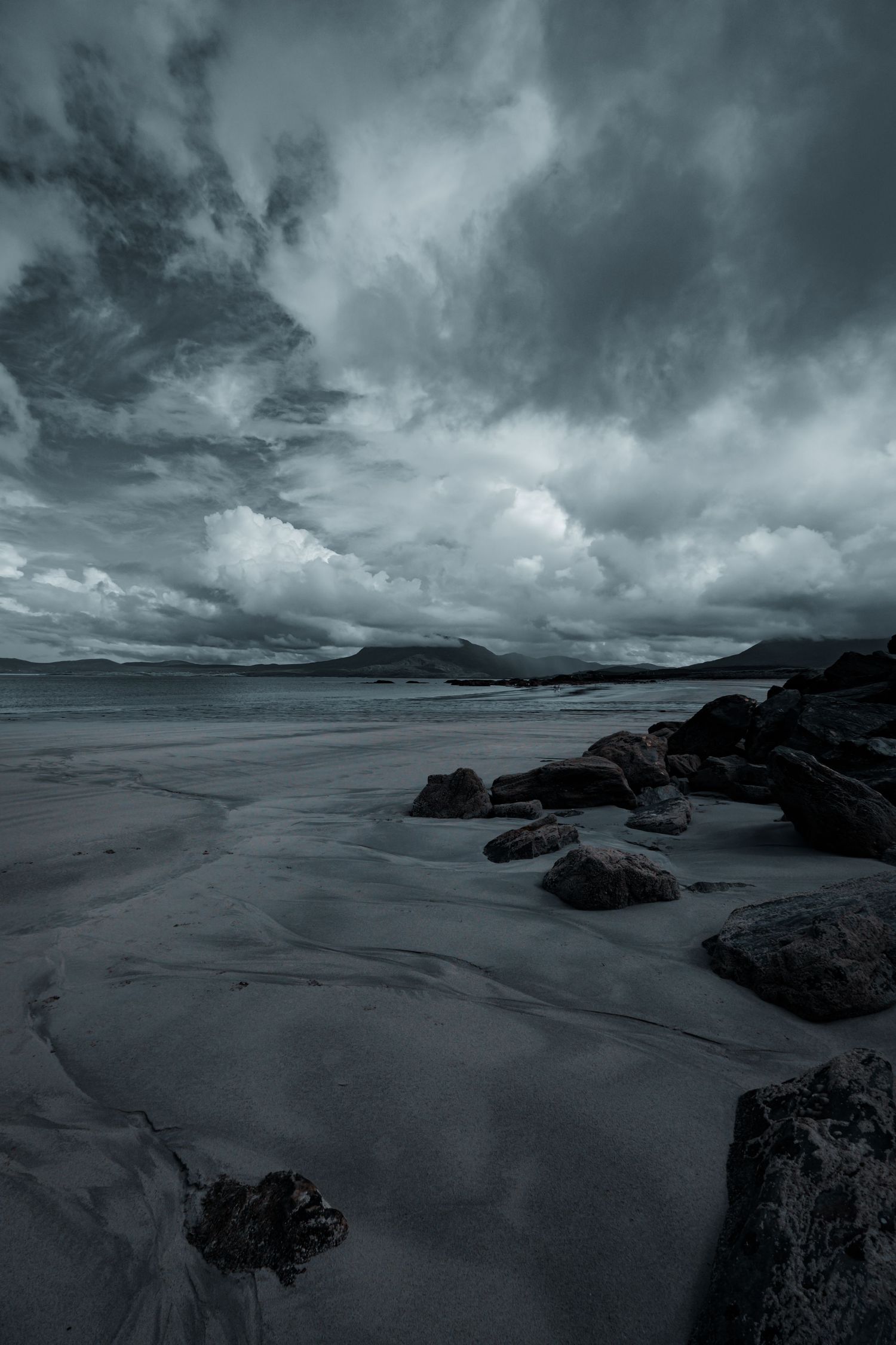 A dramatic landscape photograph by Simon Robertson, capturing a moment with a natural, considered approach.