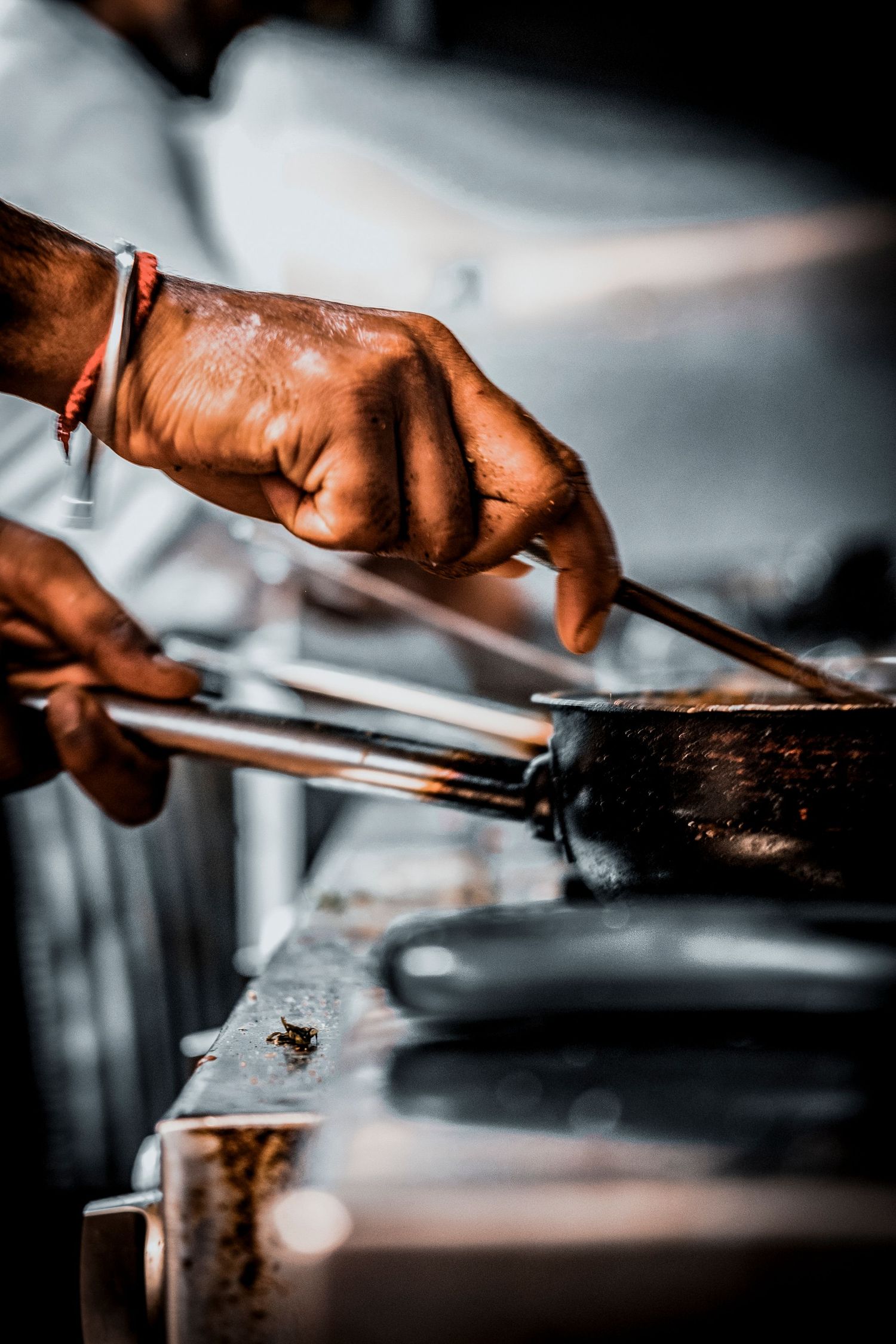 Candid portrait of a Yorkshire chef at work in the kitchen, photographed for Simon Robertson’s Shooting Chefs project.