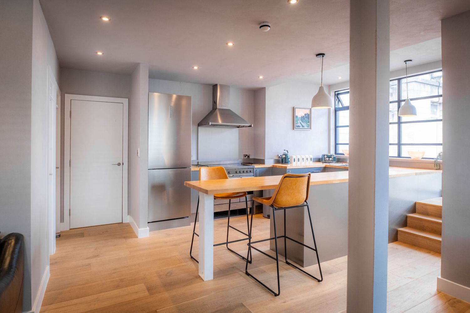 Stunning interior image of a beautifully designed kitchen diner photographed for an Airbnb client