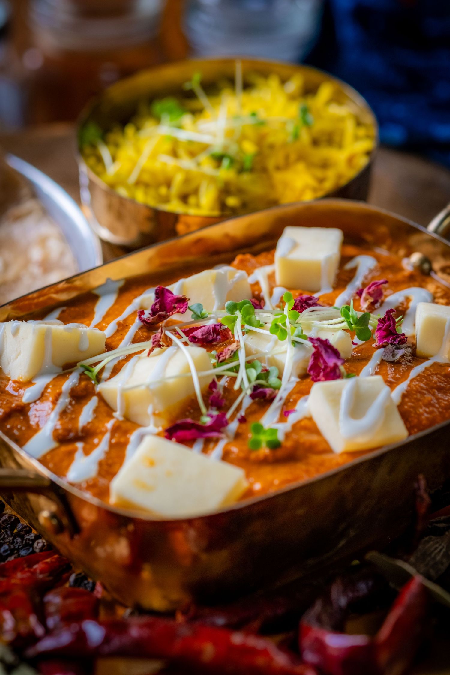 Food photograph of a selection of delicious Indian dishes in a North Leeds restaurant, styled to highlight texture and presentation