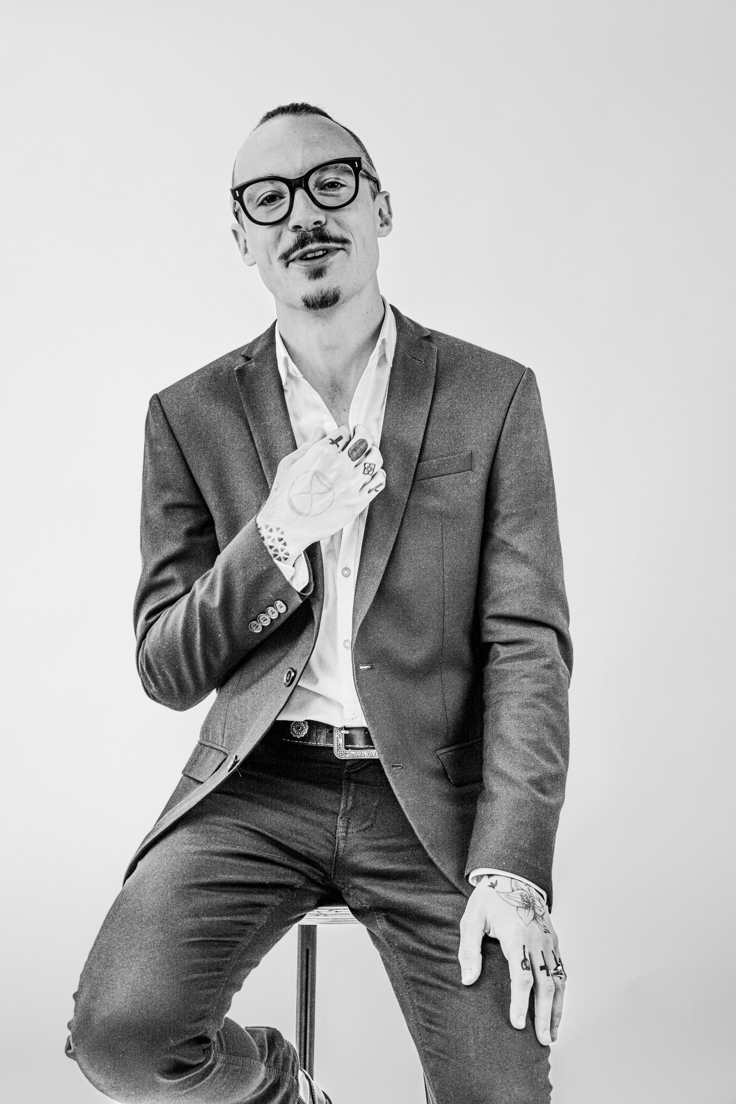 Professional headshot of business consultant in modern office environment