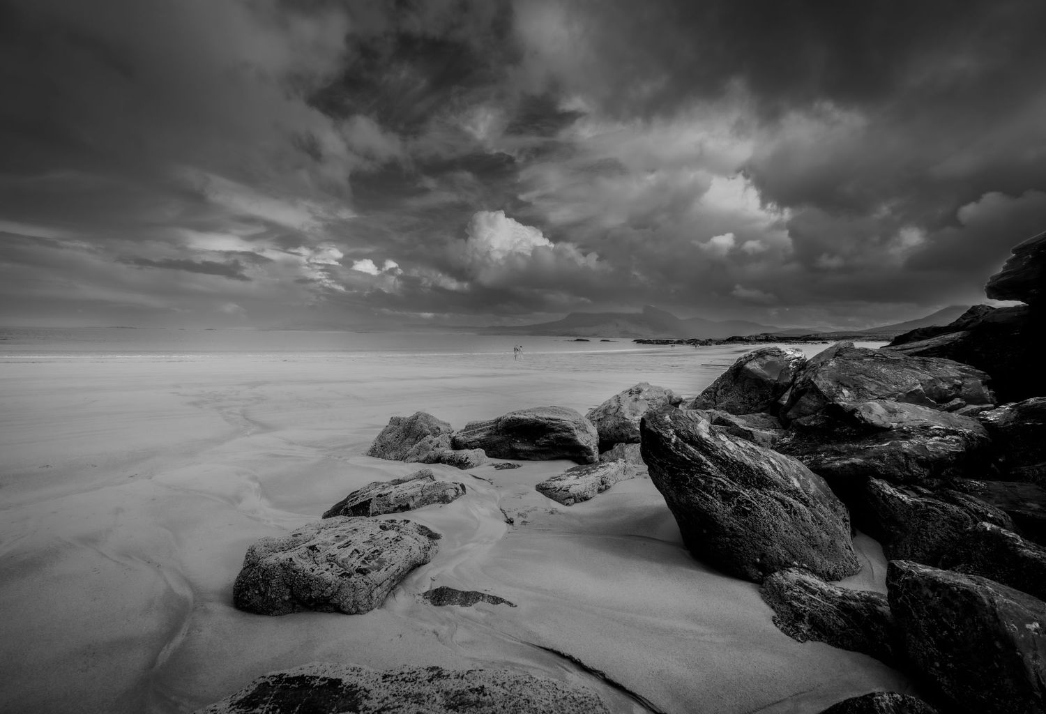 Dramatic beach-scape shot in black and which in Connemara, Ireland