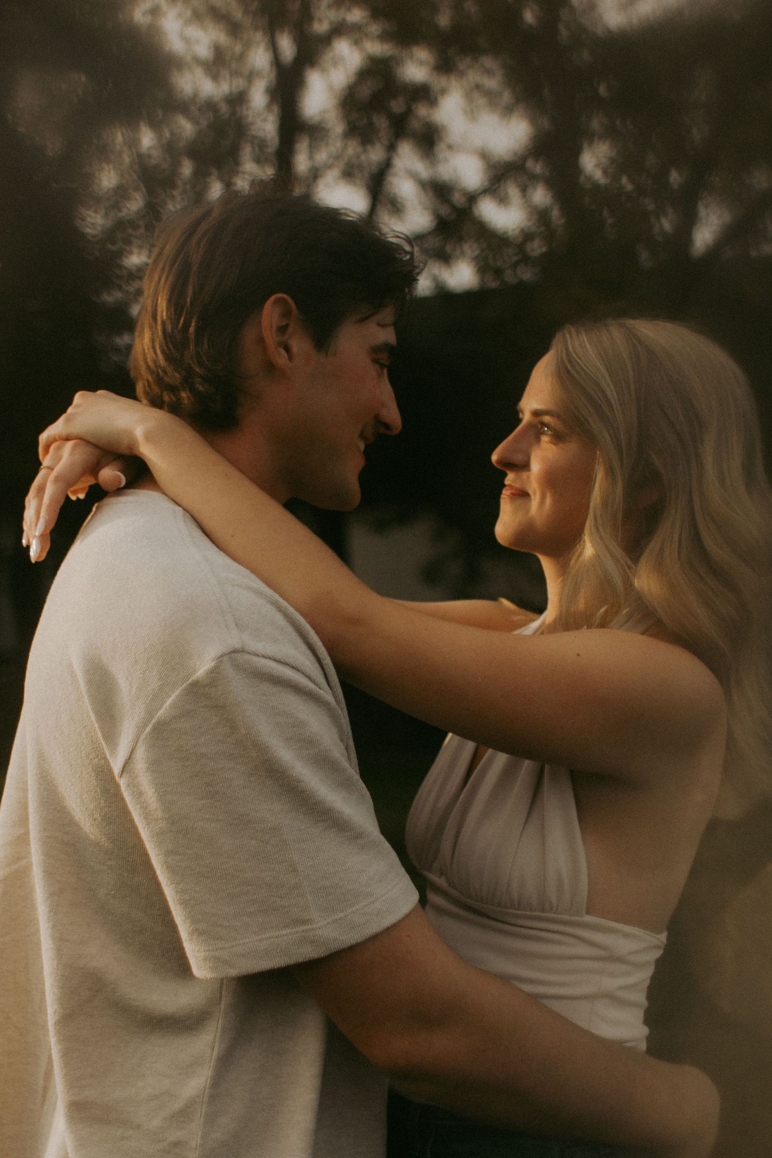 A couple, warm nostalgic moody light engagement session in Milaca, Minnesota  Elk River, MNPhotographer Photography Wedding Couples Unique