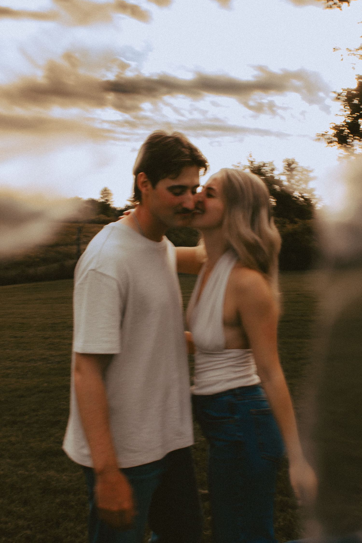 A couple, warm nostalgic moody light engagement session in Milaca, Minnesota  Elk River, MN Photographer Photography Wedding Couples Unique